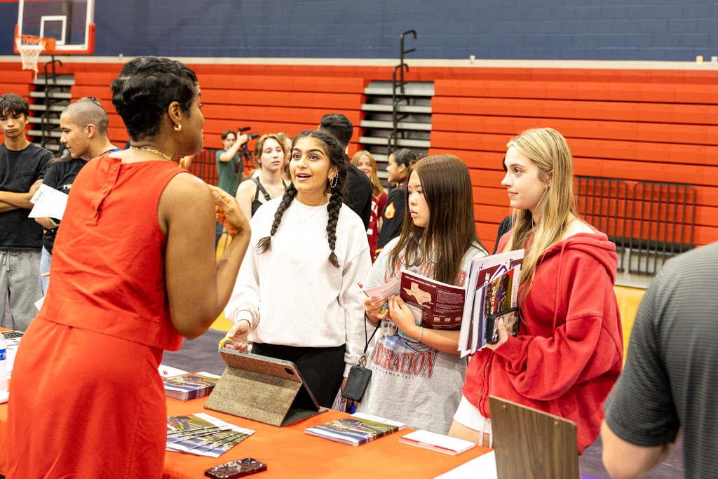 a student talks to a college advisor