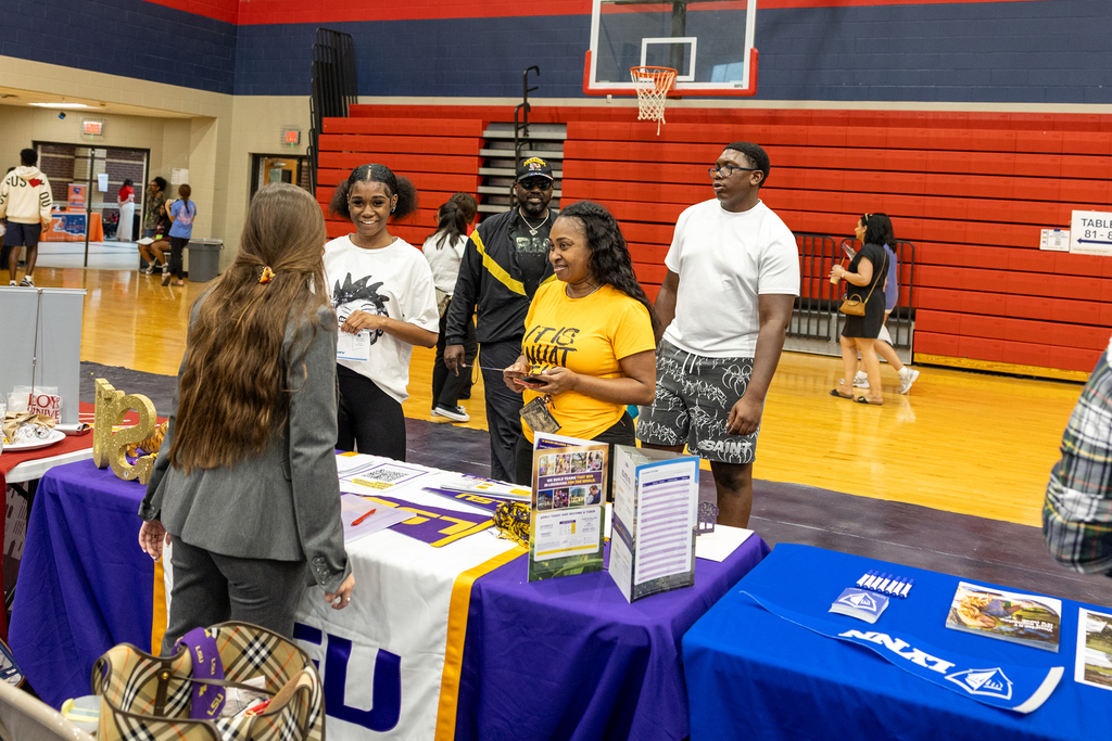 a student talks to a college advisor