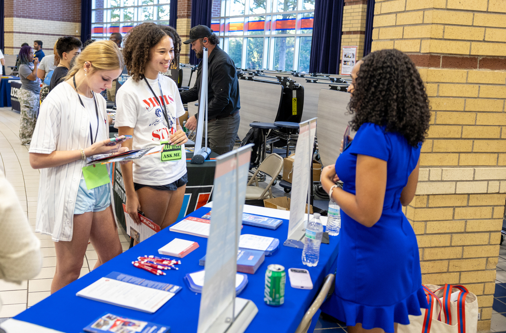 a student talks to a college advisor