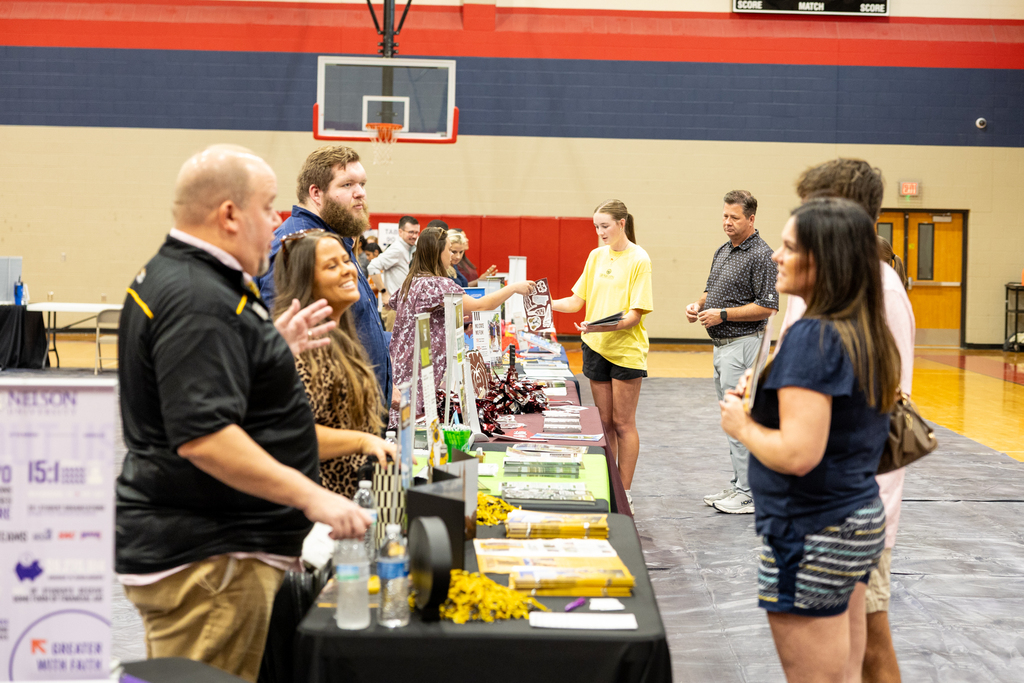 a student talks to a college advisor