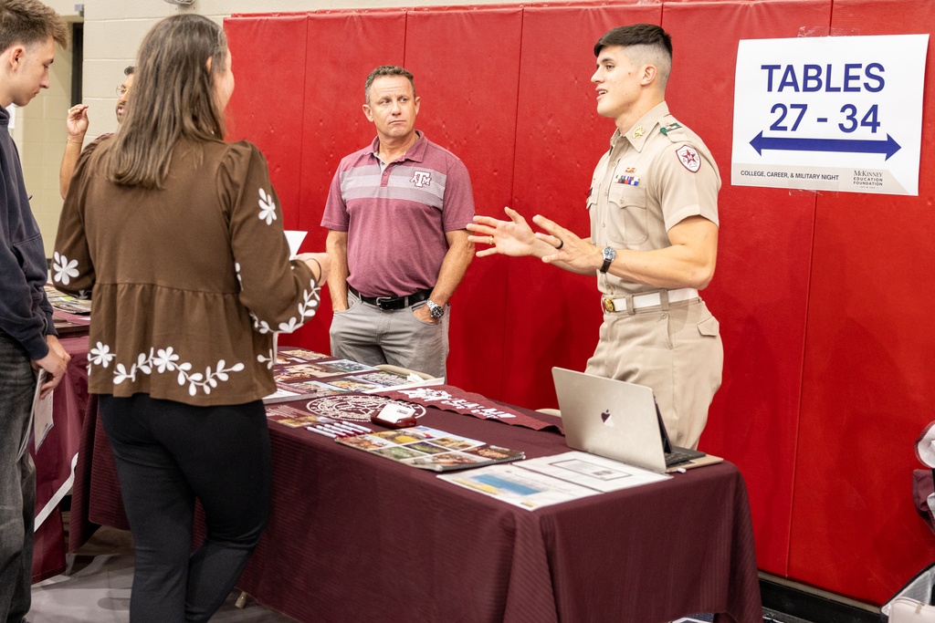 a student talks to a college advisor