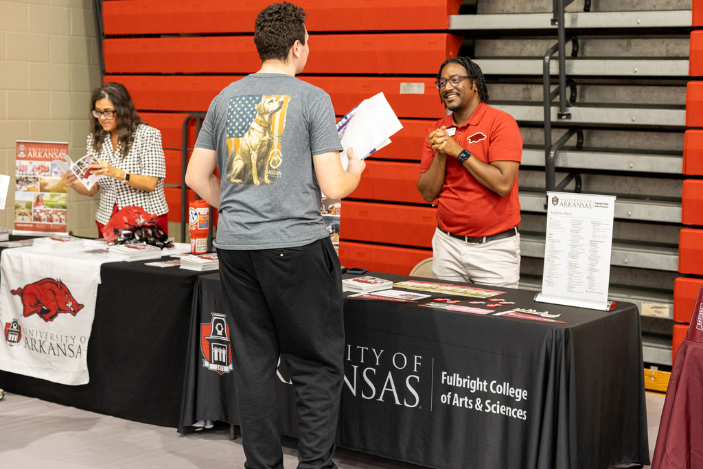 a student talks to a college advisor