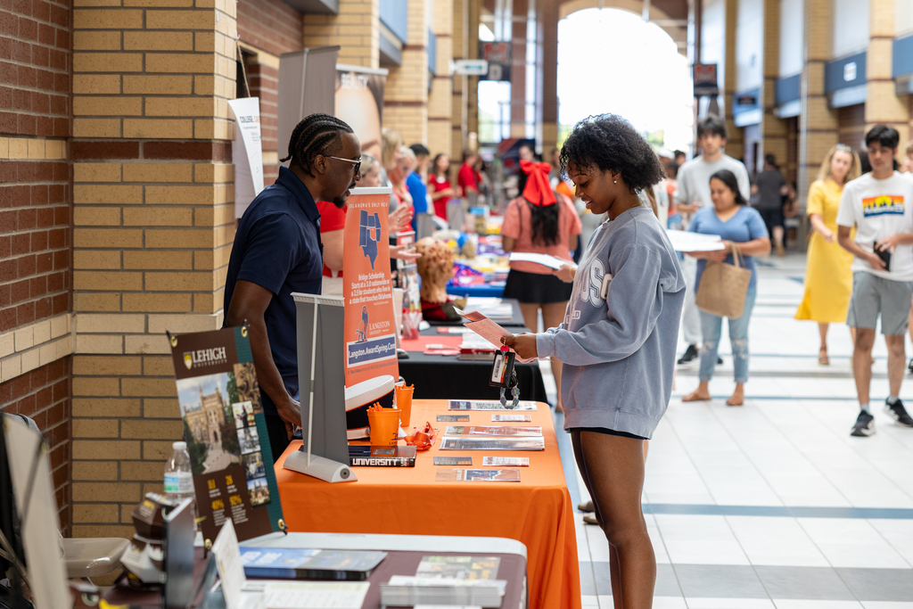 a student talks to a college advisor