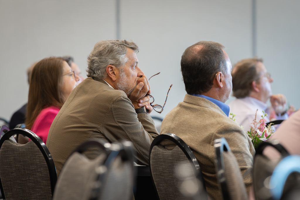 attendees sitting and listening