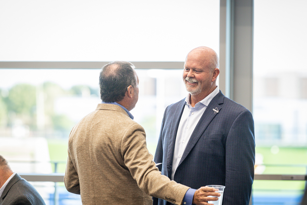 pratt talking with Bill Cox