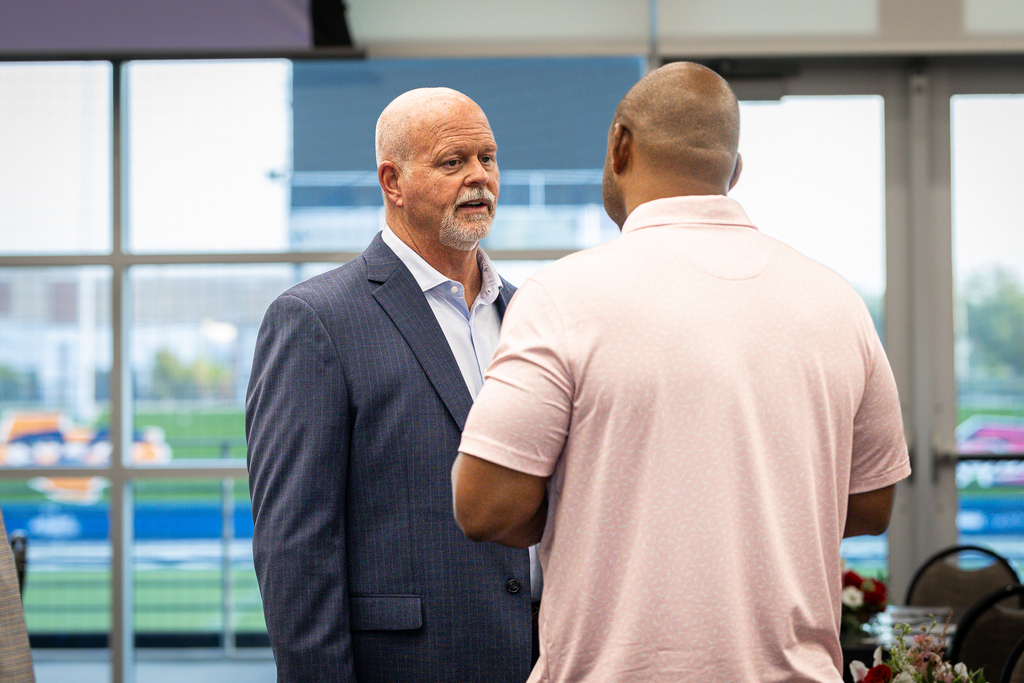 Pratt talking with city council member