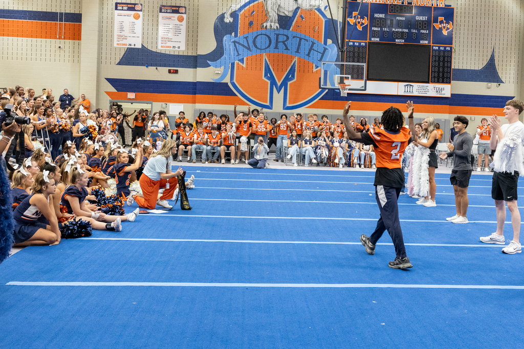 students cheer at the pep rally 