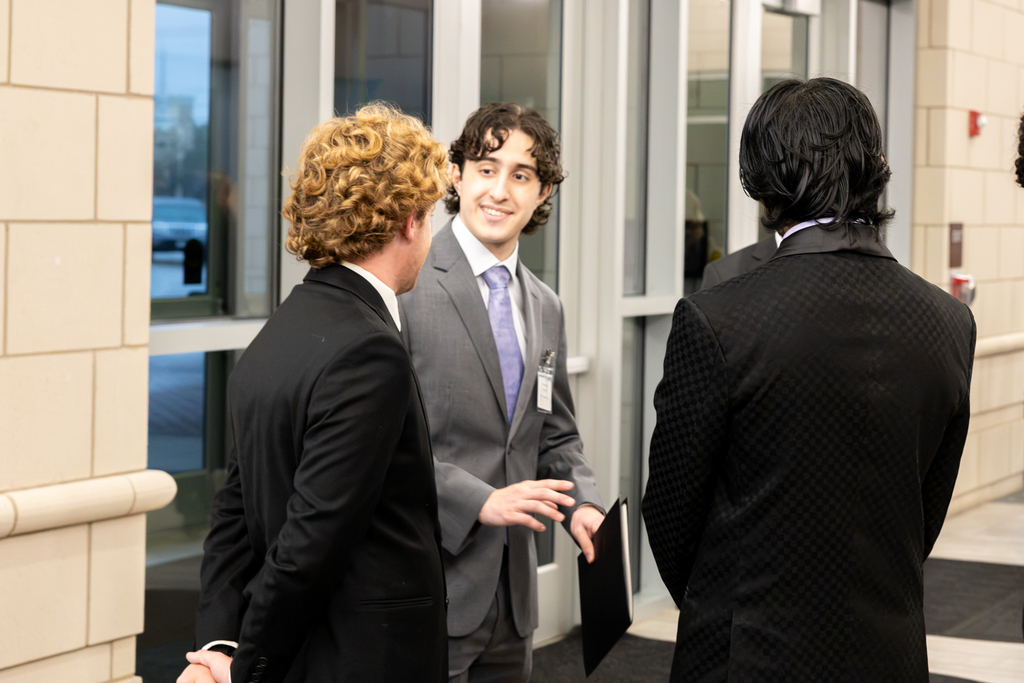 students participate in interviews at the ism business symposium 