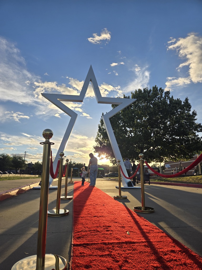 star with mom and son under it