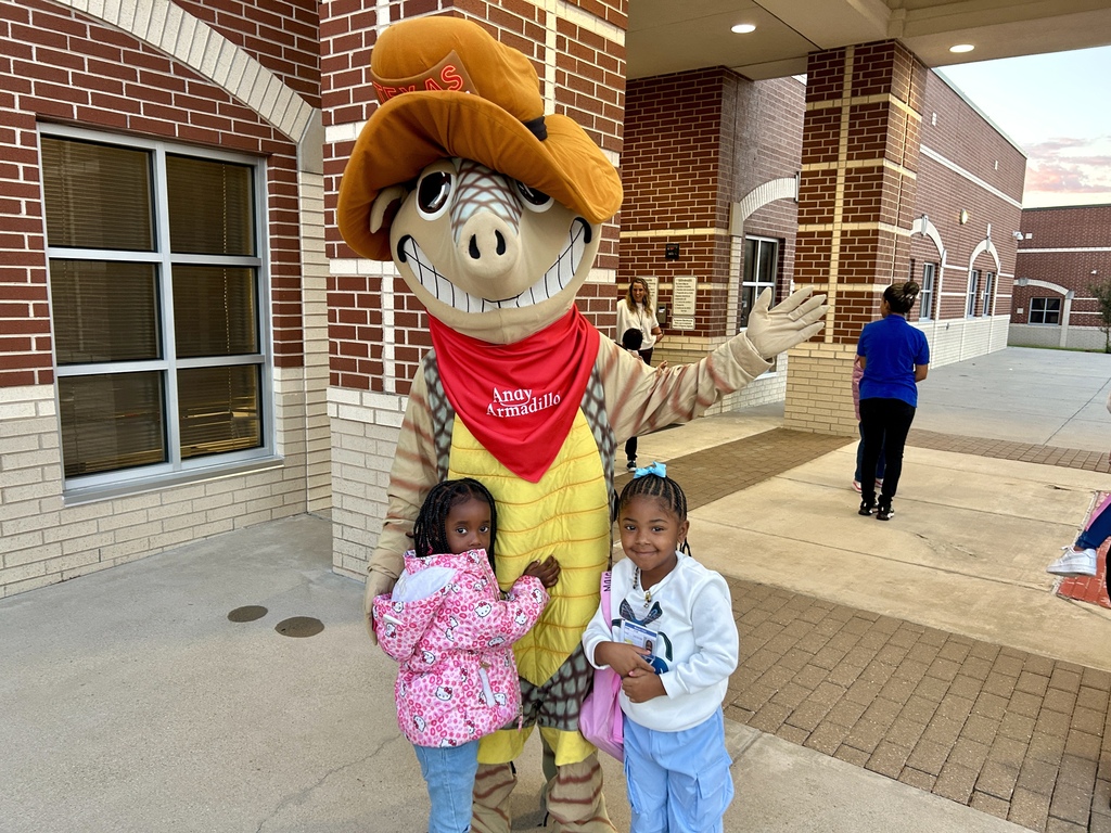 Andy the armadillo with students