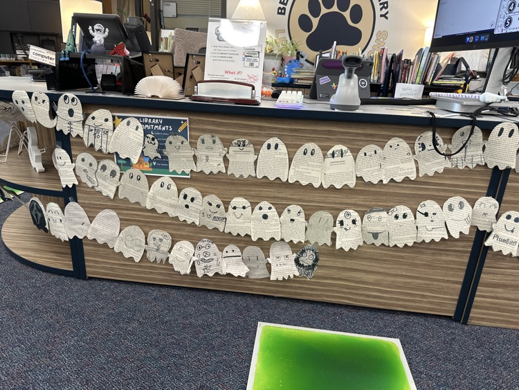 3rd-5th created ghosts out of old book pages