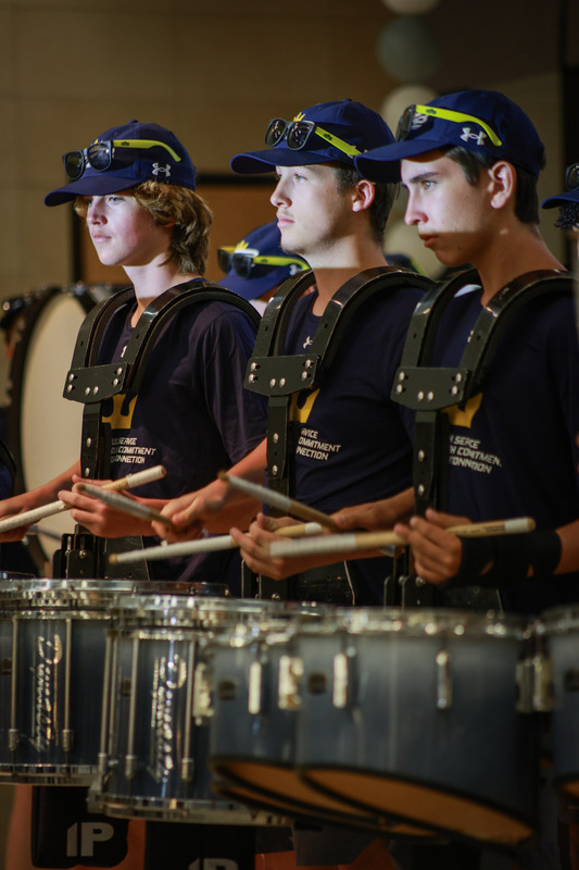 drum line members performing