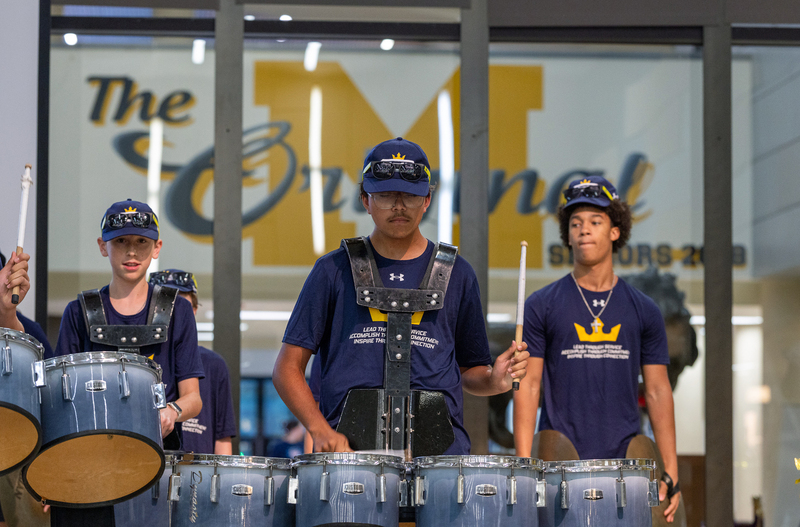 drum line members performing