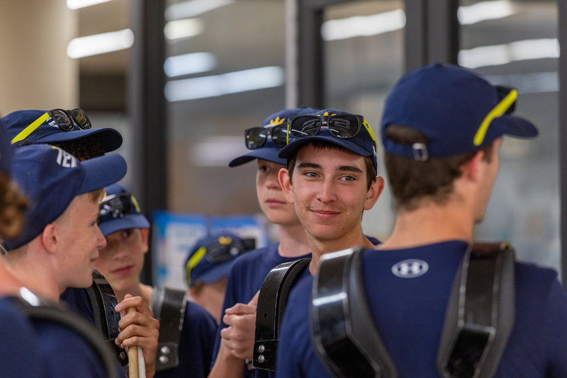 drum line group talking and smiling