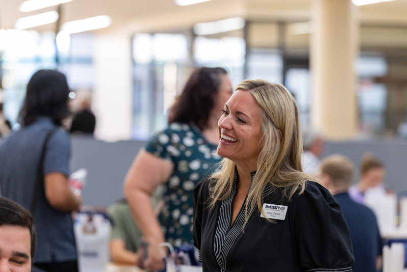 principal smiling and talking