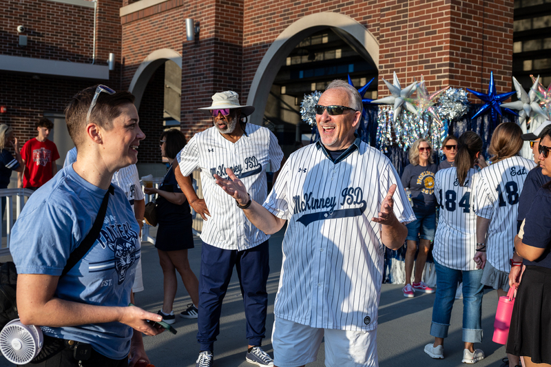 Ken Ussery greeting arrivals
