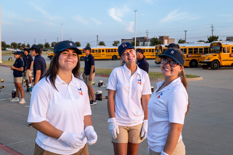 drum majors from north smiling for photo