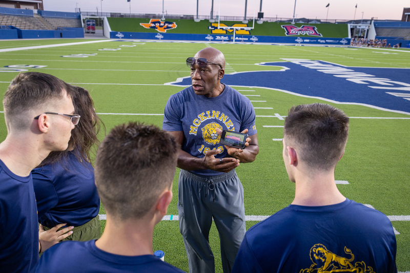 cadets getting instructions from instructor