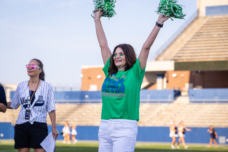 teacher being introduced and celebrating