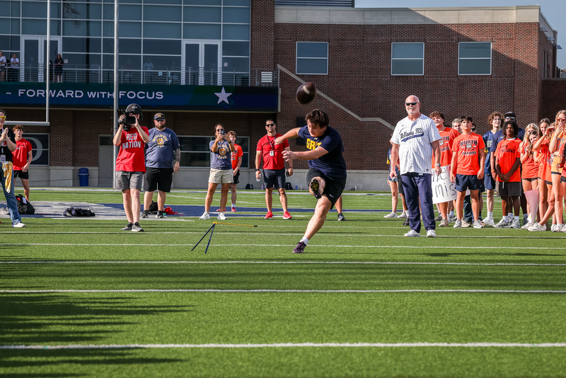field goal kicker kicking the ball