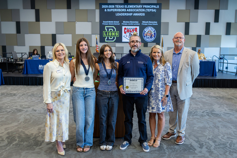 dowell representatives with award