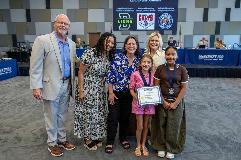 Wilmeth representatives with award