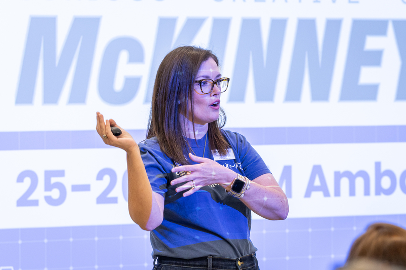 Jenny McGowan speaking in front of presentation screen