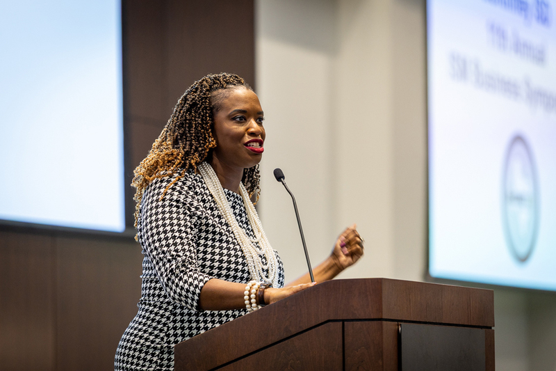 Dr. Javetta Jones Roberson speaking at the podium