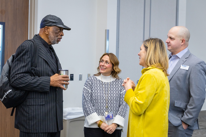 group of educators talking to Larry Jagours
