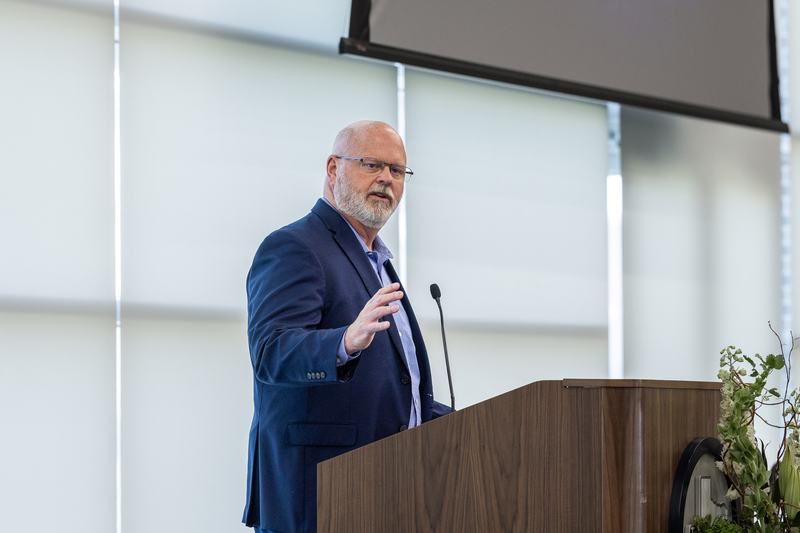 Superintendent Shawn Pratt at the podium speaking
