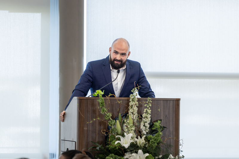 Matt Lipka at the podium speaking