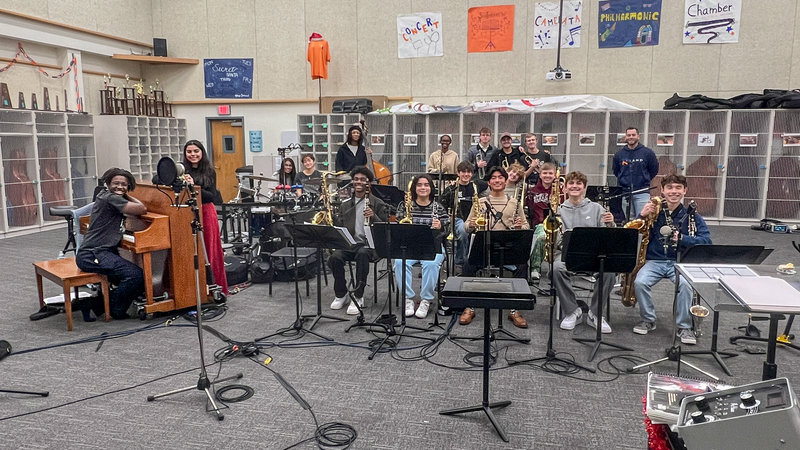 group in the band hall for recording