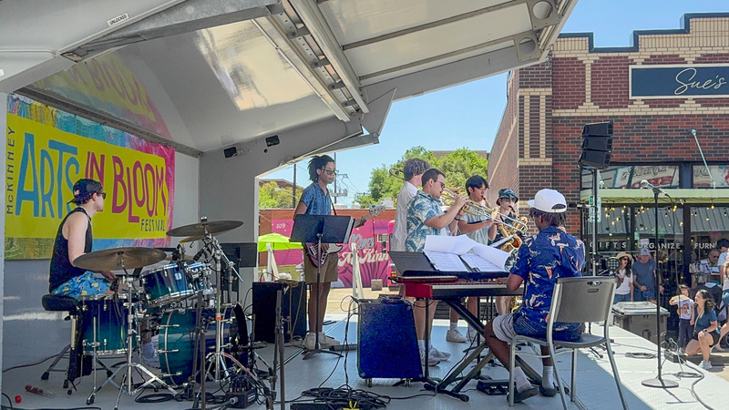 band onstage at the McKinney Arts in Bloom Festival