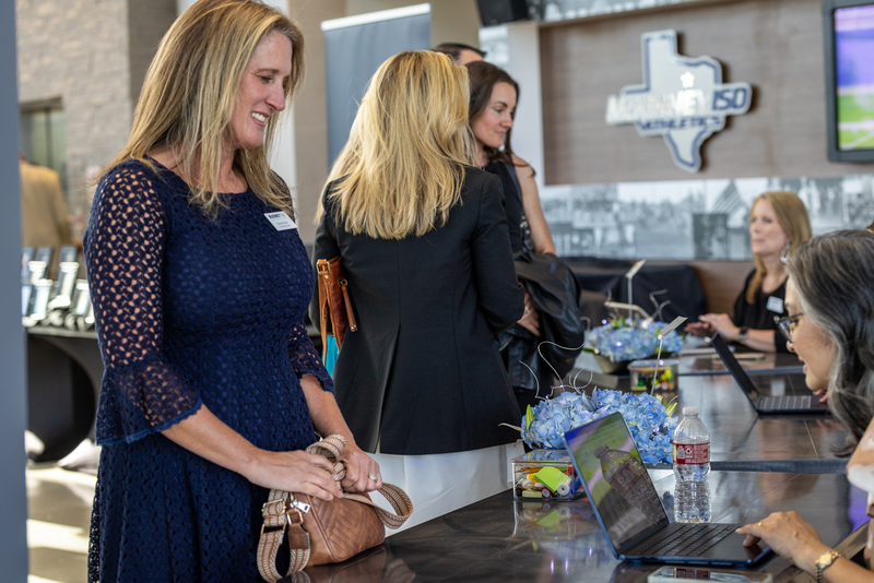 guests checking in as they arrive