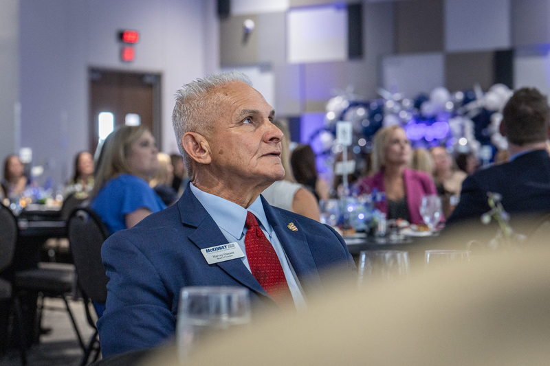 Harvey Oaxaca looking up at screen