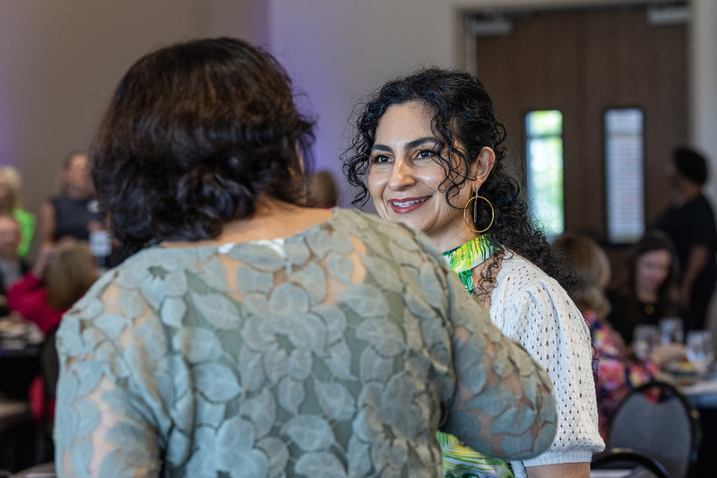 guest talking and smiling