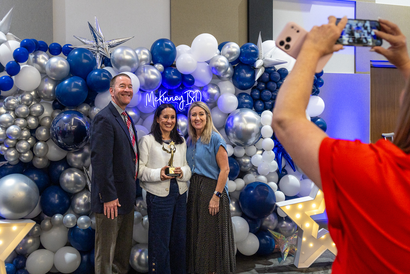 Vega teacher and admins posing