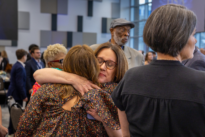 teachers hugging