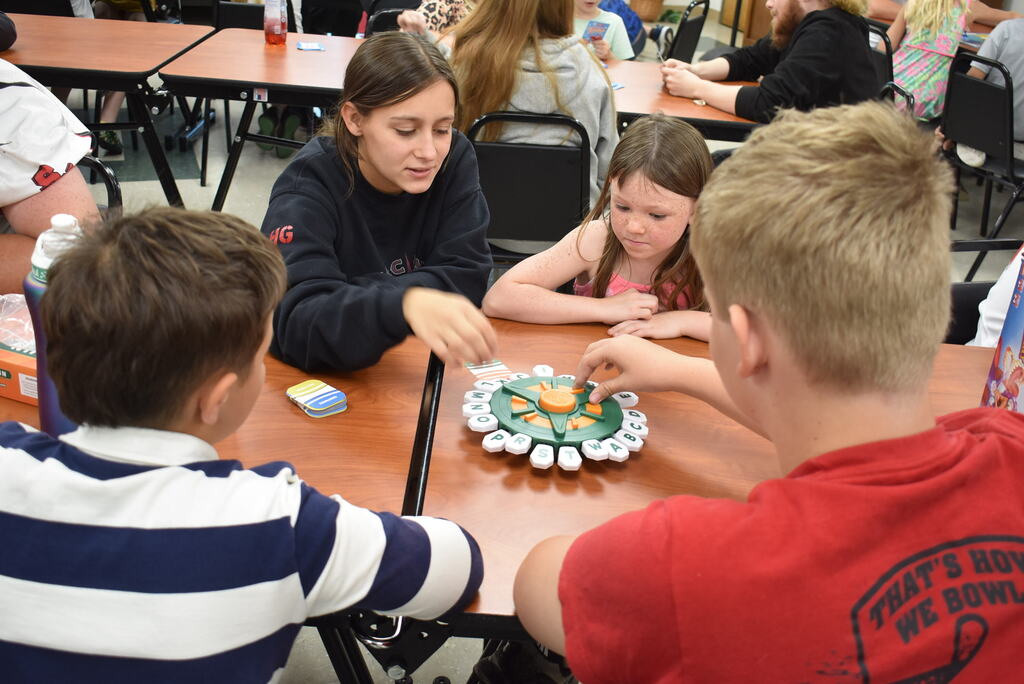 Board games and cards with K-12. 