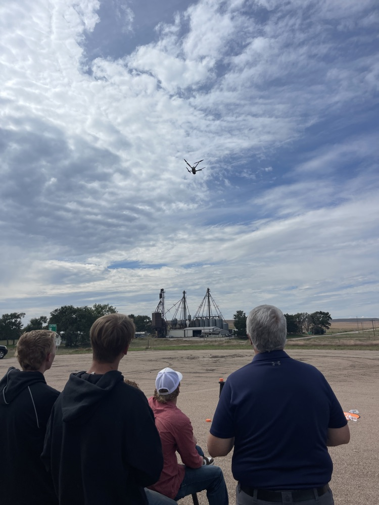 Flying drones.
