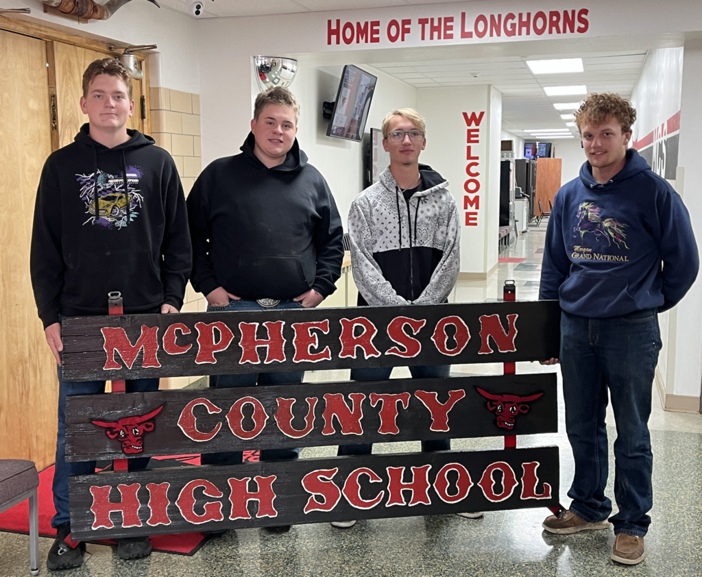 High school woods revamping outside signs.