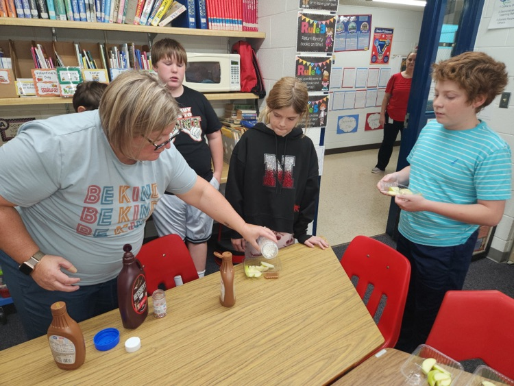 Students enjoying apples!