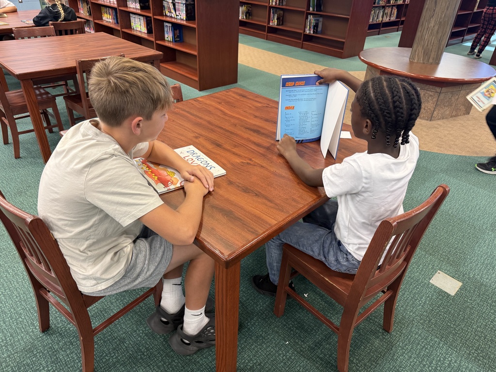 Reading to Primary students. 