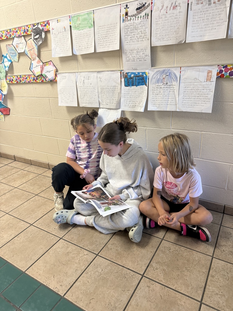 Reading to Primary students. 