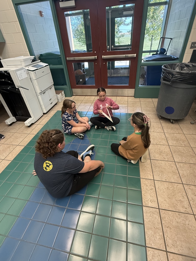 Reading to Primary students. 
