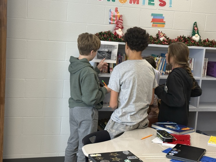 Mrs. Scanlon’s 6th grade class doing gallery walks. 