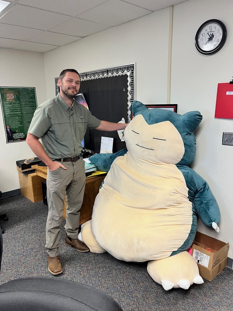 picture of principal with large stuffed animal