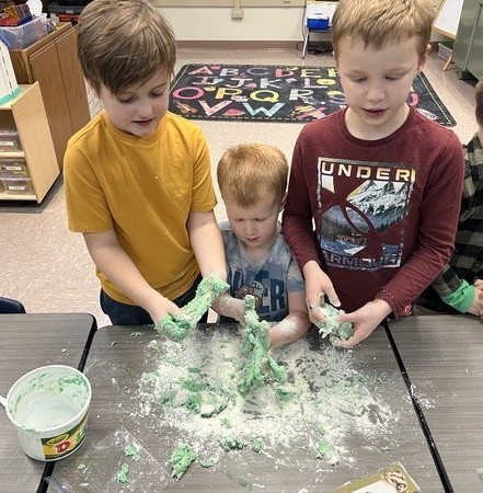students making playdough for study buddies