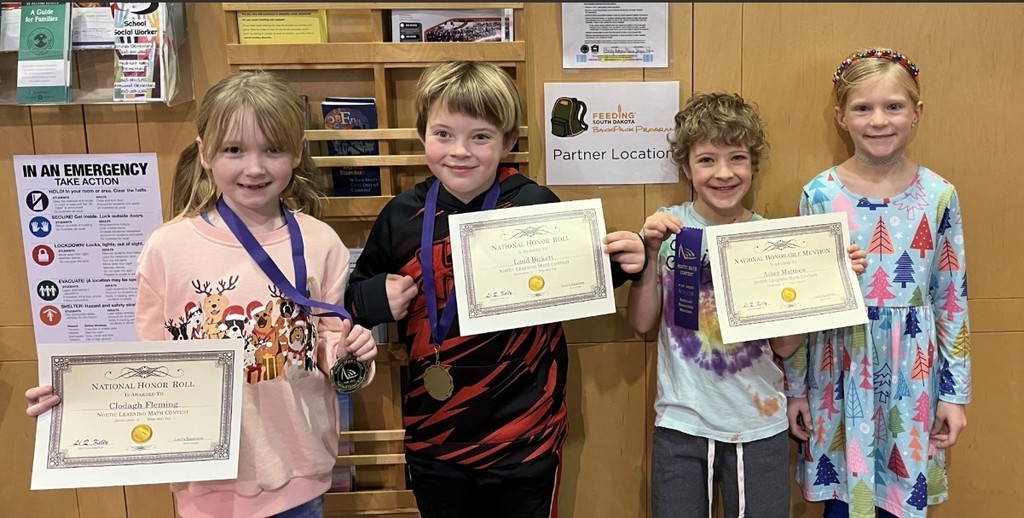 students holding certificates