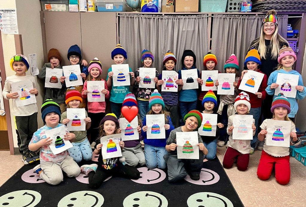 Mrs. Whitteds class with their hats that were crocheted